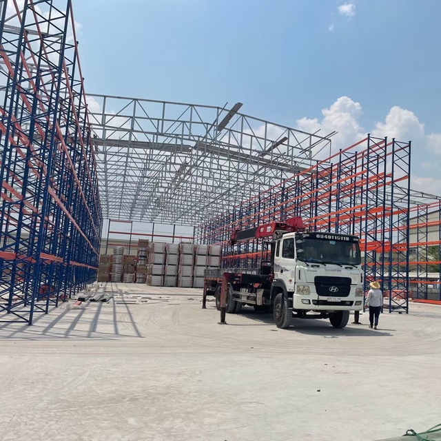 Non- Automated Rack Clad Warehouse Building Structure System